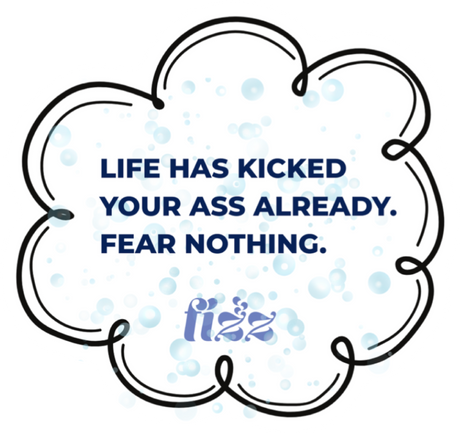 The Fear Sticker by Find Your Fizz features motivational text, “LIFE HAS KICKED YOUR ASS ALREADY. FEAR NOTHING,” inside a cloud border with light blue bubbles in the background and a small "fizz" logo at the bottom.