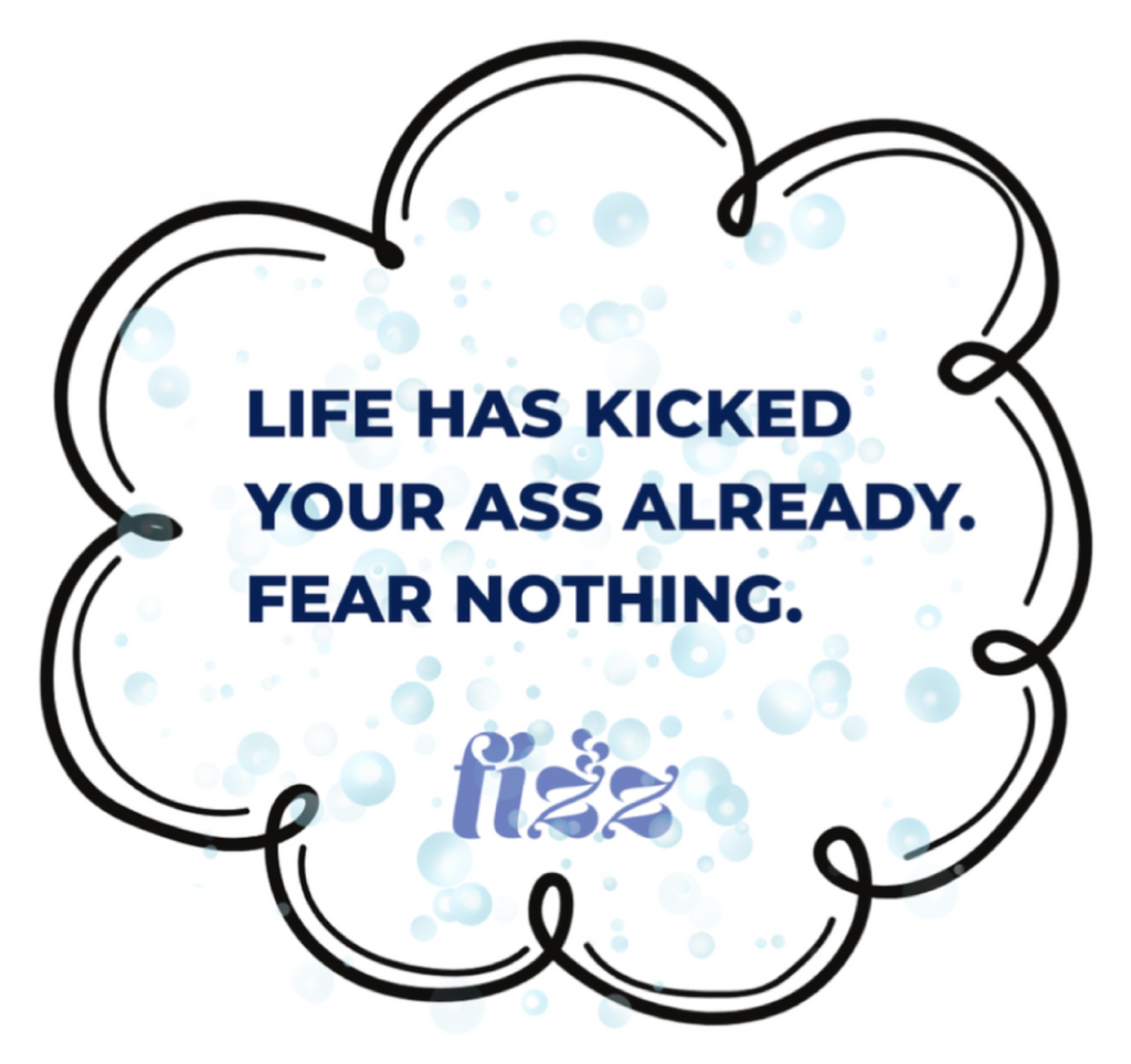 The Fear Sticker by Find Your Fizz features motivational text, “LIFE HAS KICKED YOUR ASS ALREADY. FEAR NOTHING,” inside a cloud border with light blue bubbles in the background and a small "fizz" logo at the bottom.